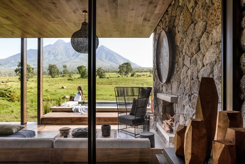 https://d2o51t207iusce.cloudfront.net/800x535/filters:quality(90):format(webp)/library/wp-content/uploads/Singita-Kwitonda-Lodge-Deck-and-pool.jpg